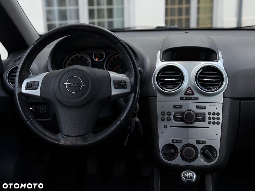 Opel Corsa 1.2 16V Cosmo - 7