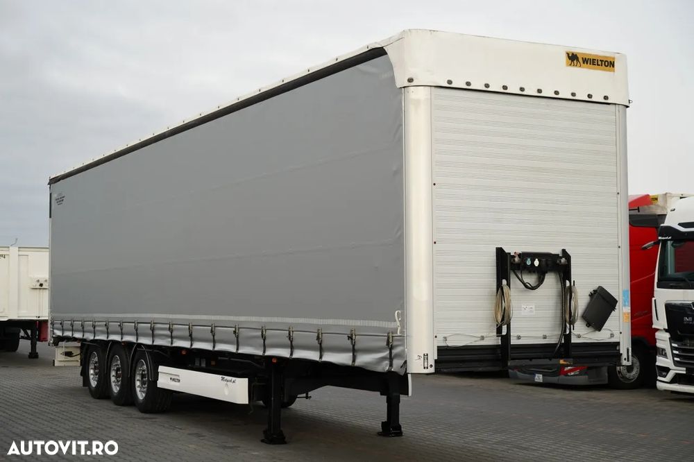 Wielton REMORCĂ CU CORTINĂ WIELTON STANDARD / ACOPERIȘ LVT / SISTEM BDE - STALPINI CULISANȚI / AXĂ RIDICABILĂ / PUȚIN FOLOSITĂ - 1