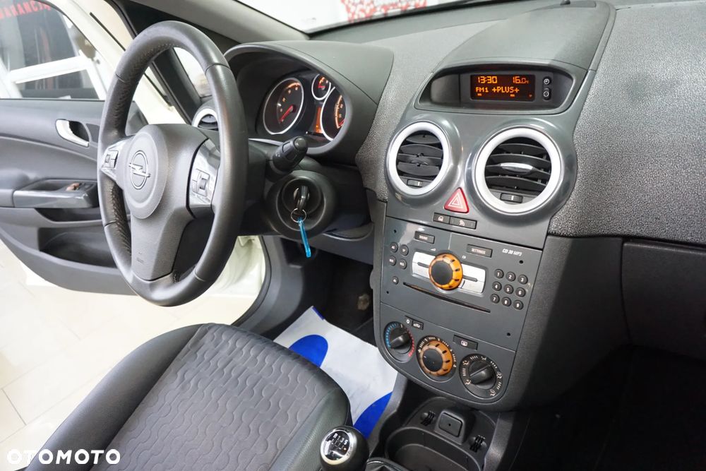 Opel Corsa 1.2 16V Enjoy - 22