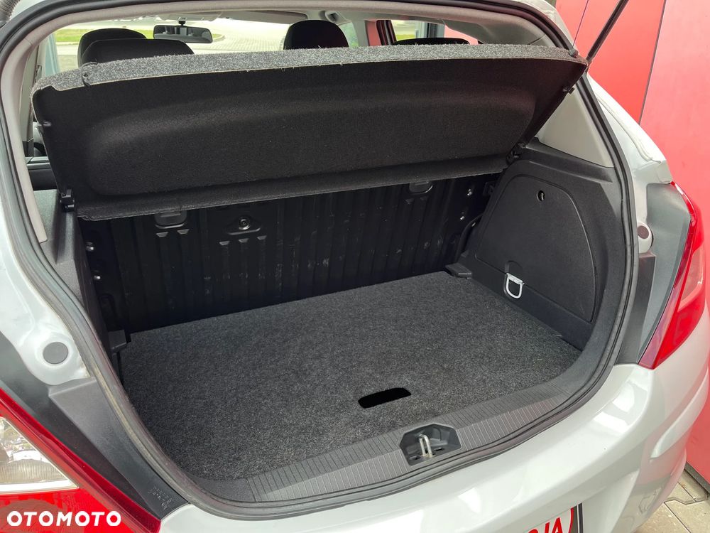 Opel Corsa 1.2 16V Enjoy - 11