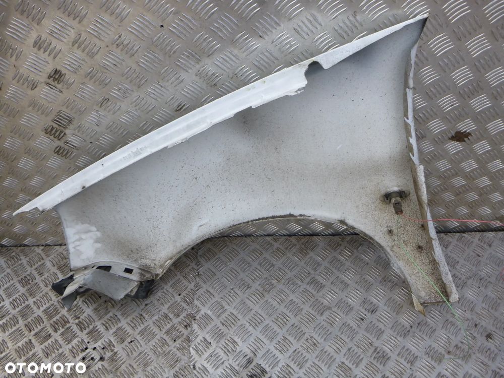 BŁOTNIK PRAWY PRZÓD PEUGEOT PARTNER I 2006r - 6
