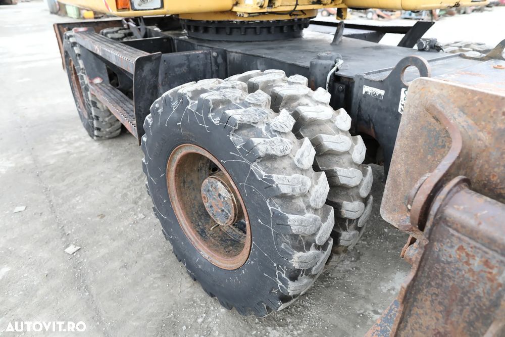 Caterpillar M315 - 12