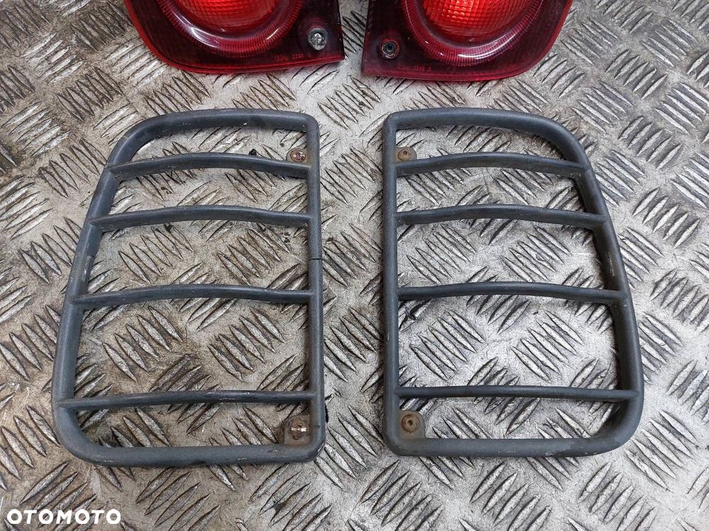 LAMPA LEWY TYŁ + PRAWY TYŁ KRATKI OSŁONY LAND ROVER FREELANDER I - 4