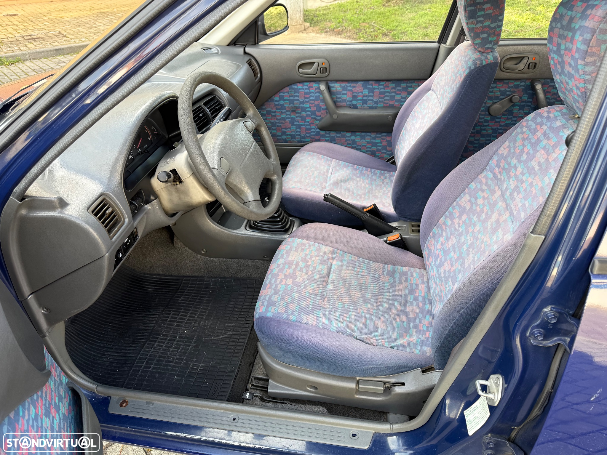 Suzuki Swift 1.0 GLX DA - 10