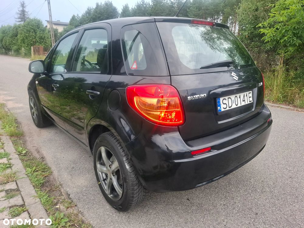 Suzuki SX4 1.6 GLX / Comfort - 12