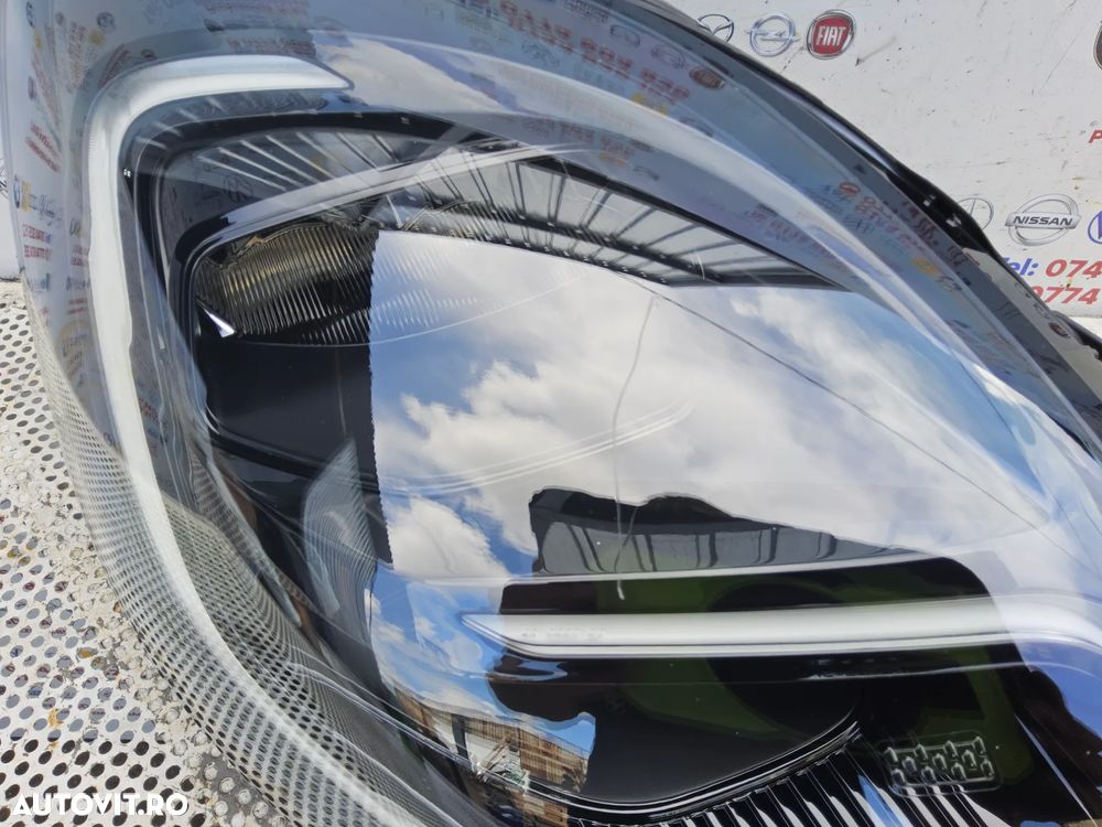 Far Led dreapta Ford Puma  cod l1tb13e014mb far led dreapta cu 1 ureche rupta mic defect - 2