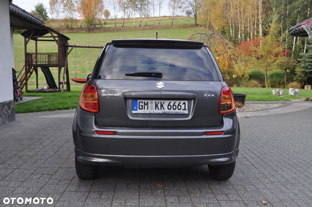 Suzuki SX4 1.6 Comfort Plus - 16