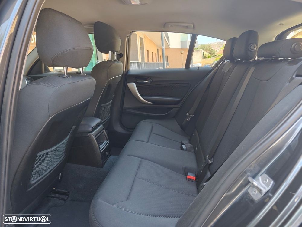 BMW 116 i Advantage — fotografia 10