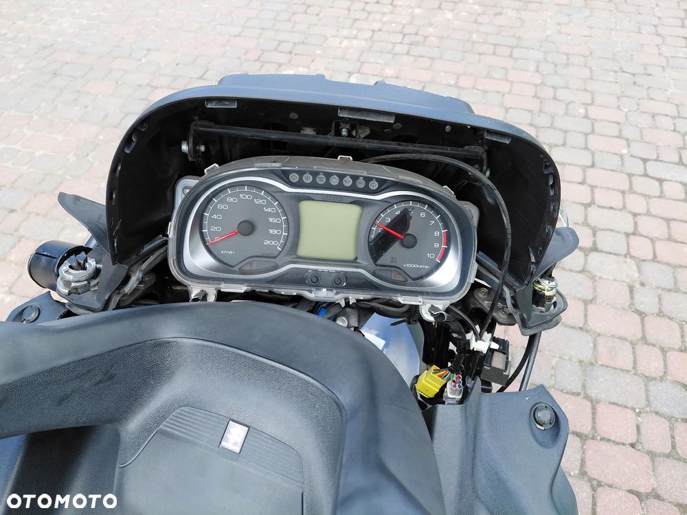Suzuki Burgman - 10