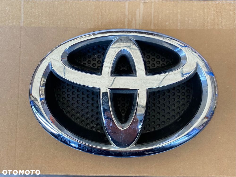 TOYOTA YARIS 3 III AURIS 1 I ŁADNY ! ! ! ORYGINALNY EMBLEMAT LOGO ZNACZEK ATRAPY GRILLA GRILA ATRAPA chłodnicy GRILL znaczek zderzaka na zderzak przedni przód Corolla 06-12 75311-02140 7531102140 Wwa - 1