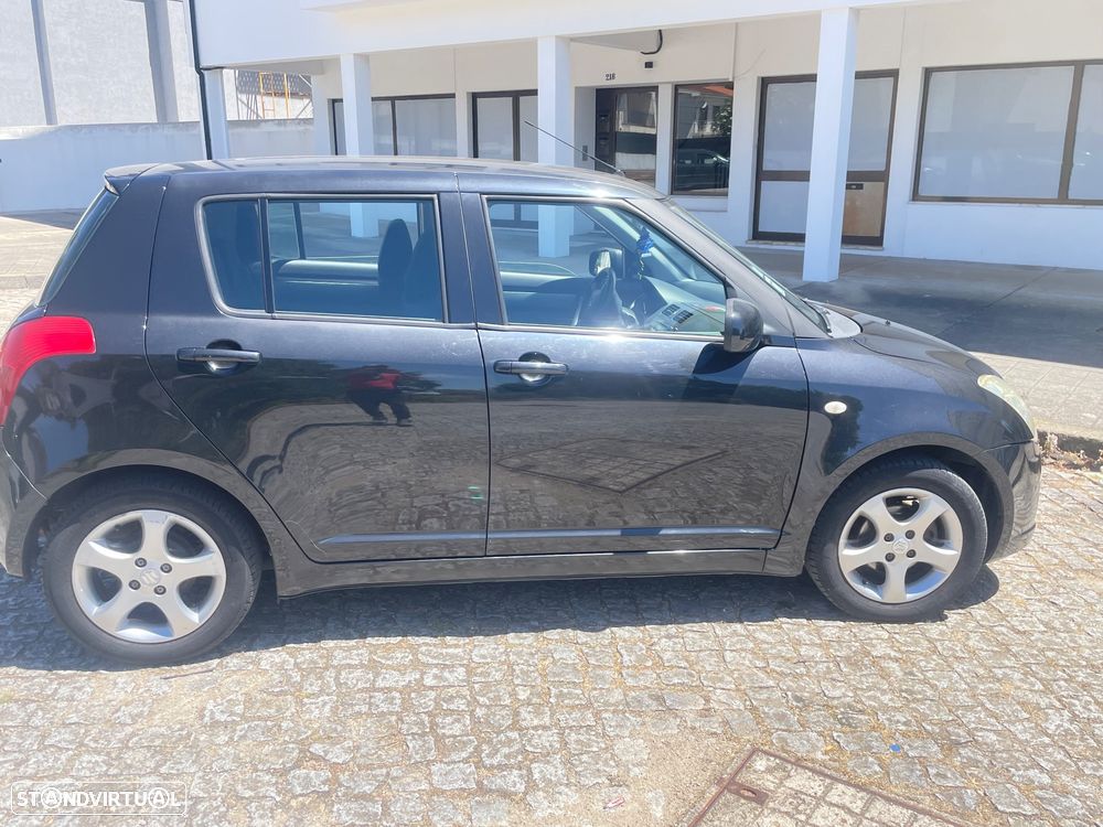 Suzuki Swift 1.3 DDiS GL - 13