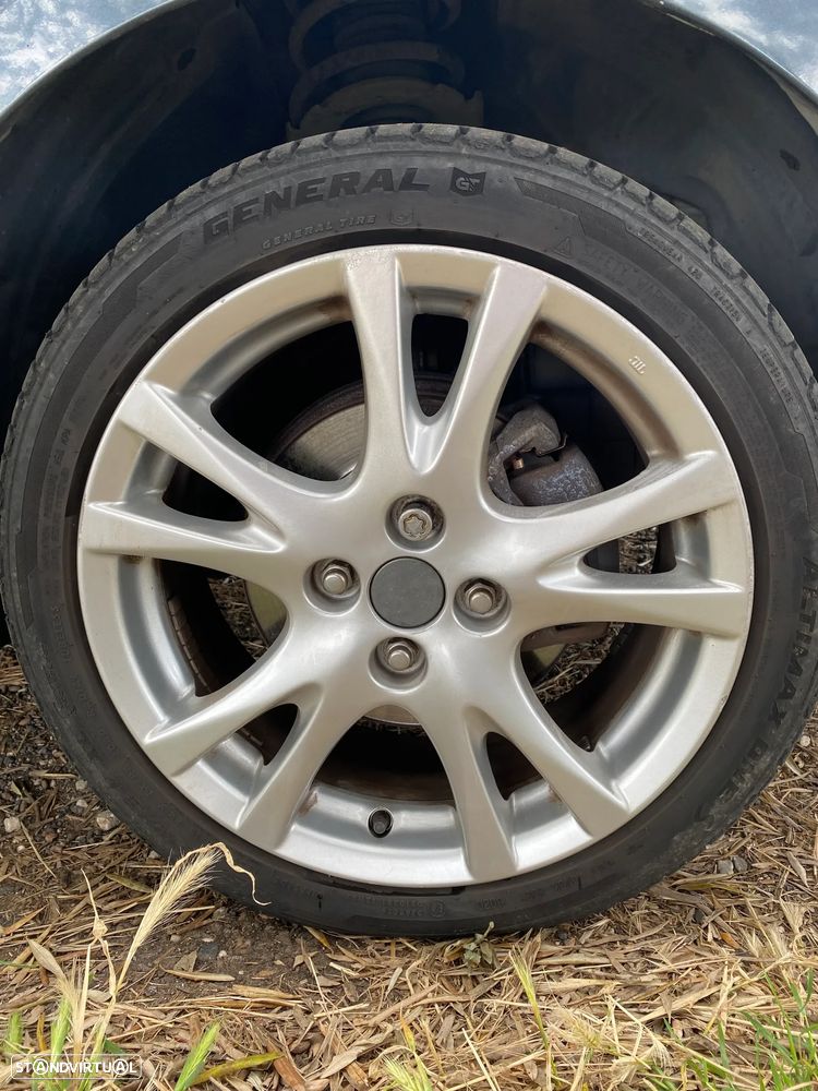 Mazda 2 1.3 MZR Exclusive - 13
