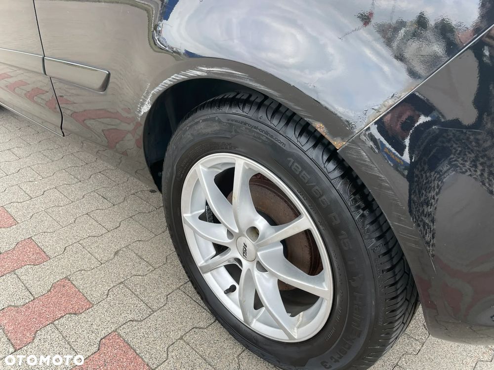 Opel Corsa 1.4 16V Cosmo - 9