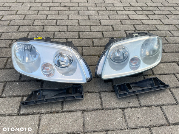 VW CADDY 03- LAMPA LEWA PRAWA PRZÓD REFLEKTOR