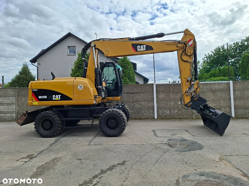 Caterpillar CAT M 315 D - 9