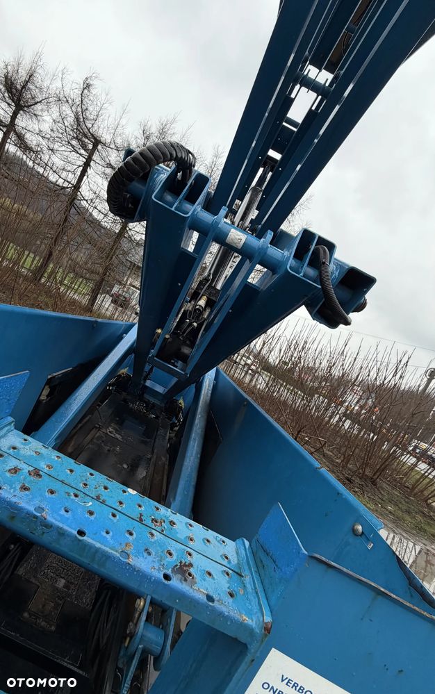 Genie Zwyżka Terenowa GS-4069RT Podnośnik Nożycowy Dźwig 14,5 metra jak Nowa z salonu! 1300 mtg. 2016 rok, Fabryczna przetwornica! 2x Gniazdo 230v góra dół. Pochodzi z Norweskiego urzędu Komuny. Zadbana! 4x4 Silnik Kubota. Zero Luzów i wycieków. Aktualne Serwisy DEKRA BMWT. Wysuwany Balkon. Sterowana z dołu i góry. Okazja Tanio !! Dokumentacja! Bez DPF, adBLUE - 22