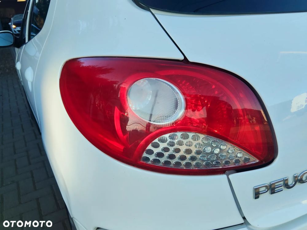 Peugeot 206 plus 75 - 23