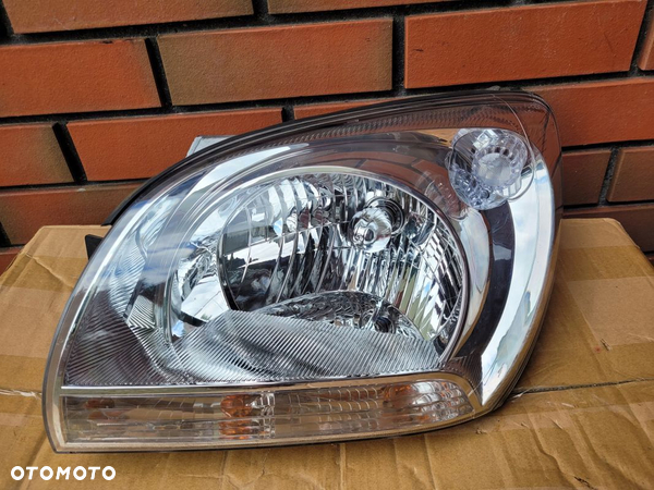 DEPO Reflektor lewy KIA SPORTAGE II 04-