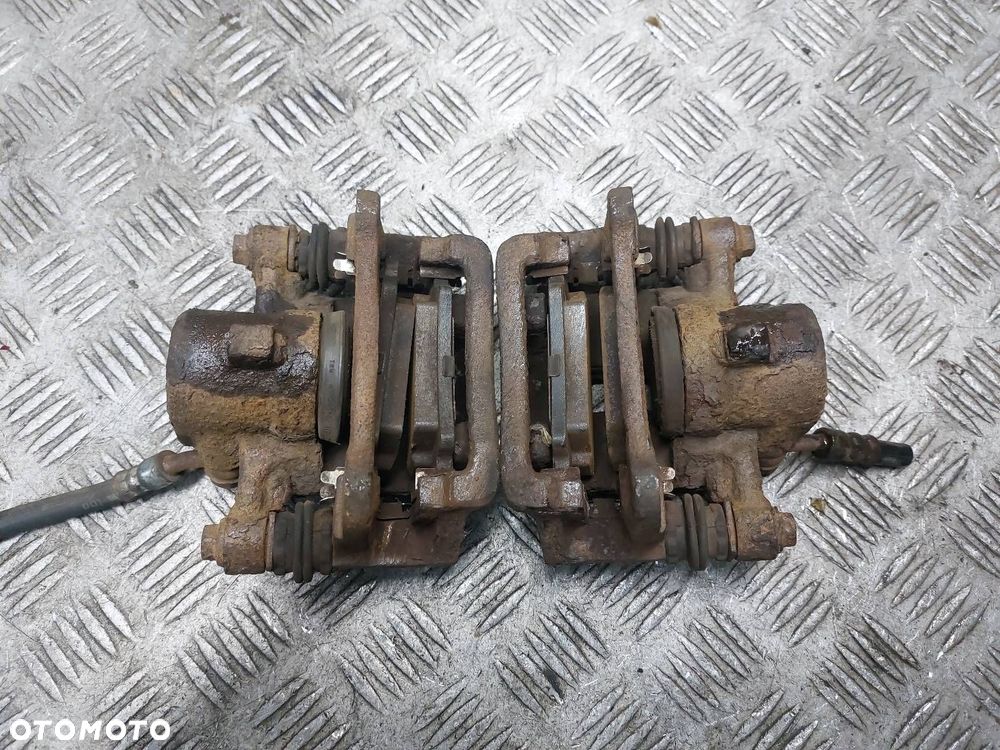 TARCZE HAMULCOWE TYŁ + ZACISKI TOYOTA COROLLA E12 1.6 16V - 10