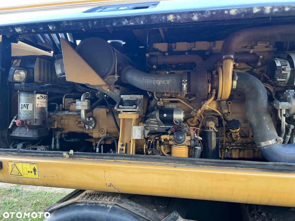 Caterpillar 318 D - 14