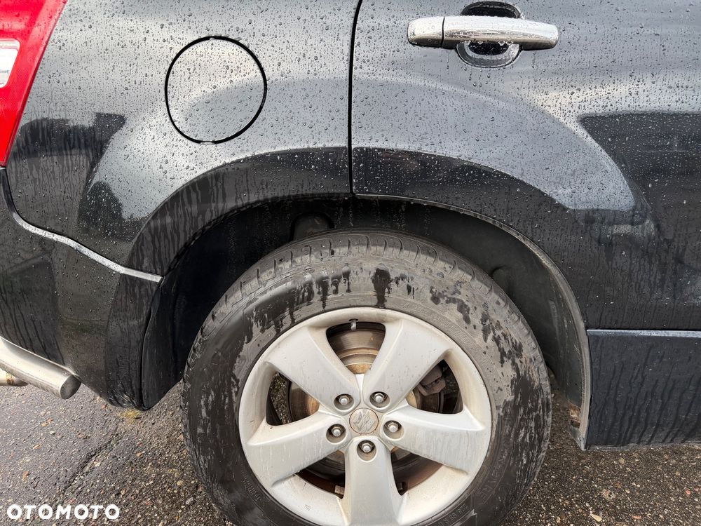 Suzuki Grand Vitara 2.0 - 7