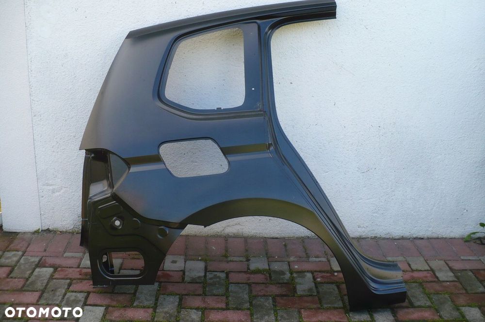 VW TOURAN 5TA - BŁOTNIK PRAWY TYŁ