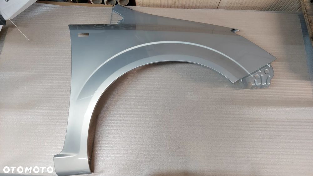 ZAFIRA B 05-11 rok BŁOTNIK LEWY LUB PRAWY Z167 CYNK - 2