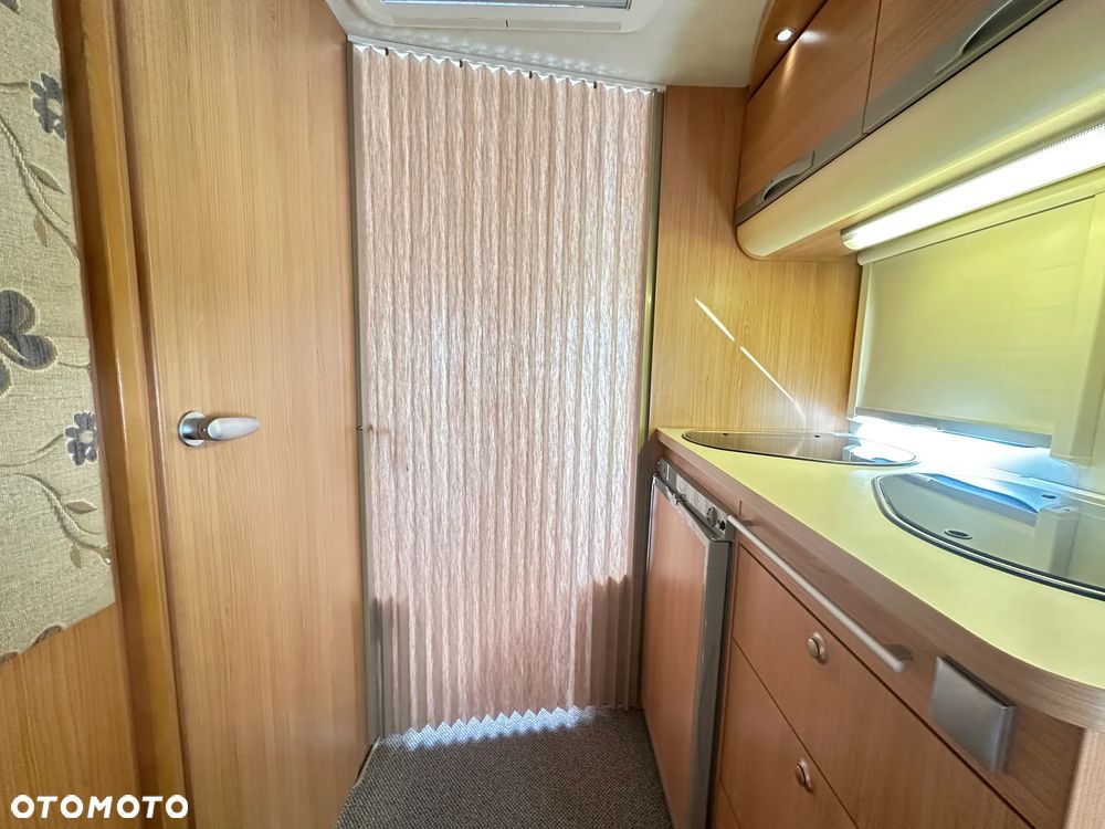 Adria ADORA 472 LU z napędem i markizą ze ścianami.  DMC 1300 - 30