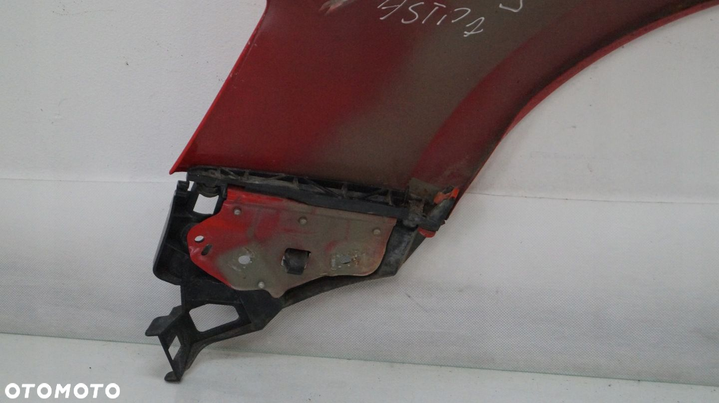 BŁOTNIK PRZEDNI PRAWY OPEL ASTRA J Z50B 2012 - 11