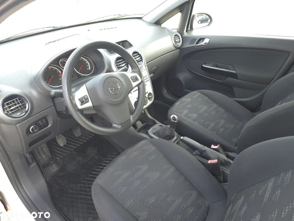 Opel Corsa 1.2 16V Enjoy - 21