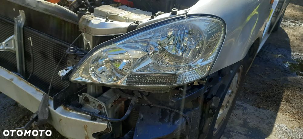 Toyota Avensis Verso 1 clm20l Lakier 1c0  Maska błotnik drzwi  Reflektor lampa przód tył - 6