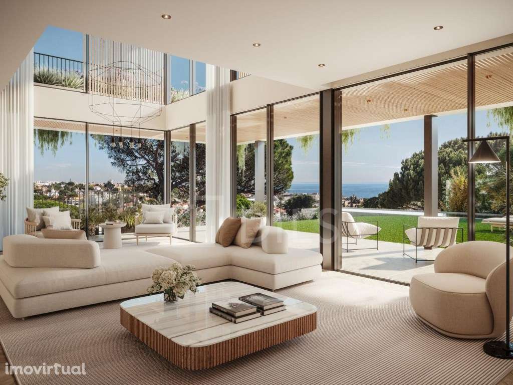 Moradia T5 com jardim, piscina e estacionamento no Estoril - Grande imagem: 3/20