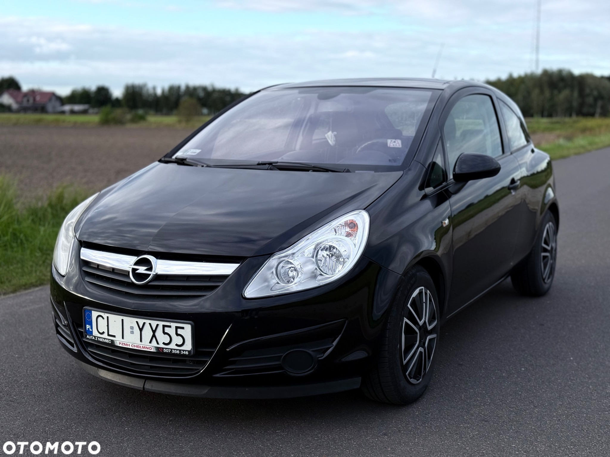 Opel Corsa 1.2 16V Cosmo - 6