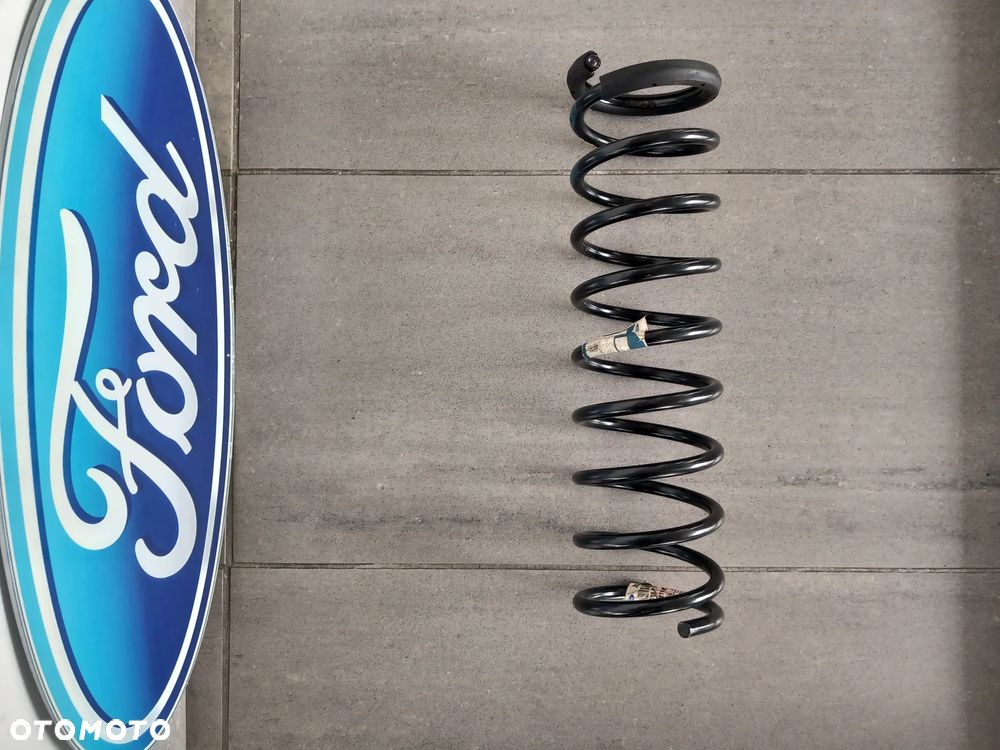 Sprężyna zawieszenia tylna Ford Escort 1990-1995 6991166 - 1