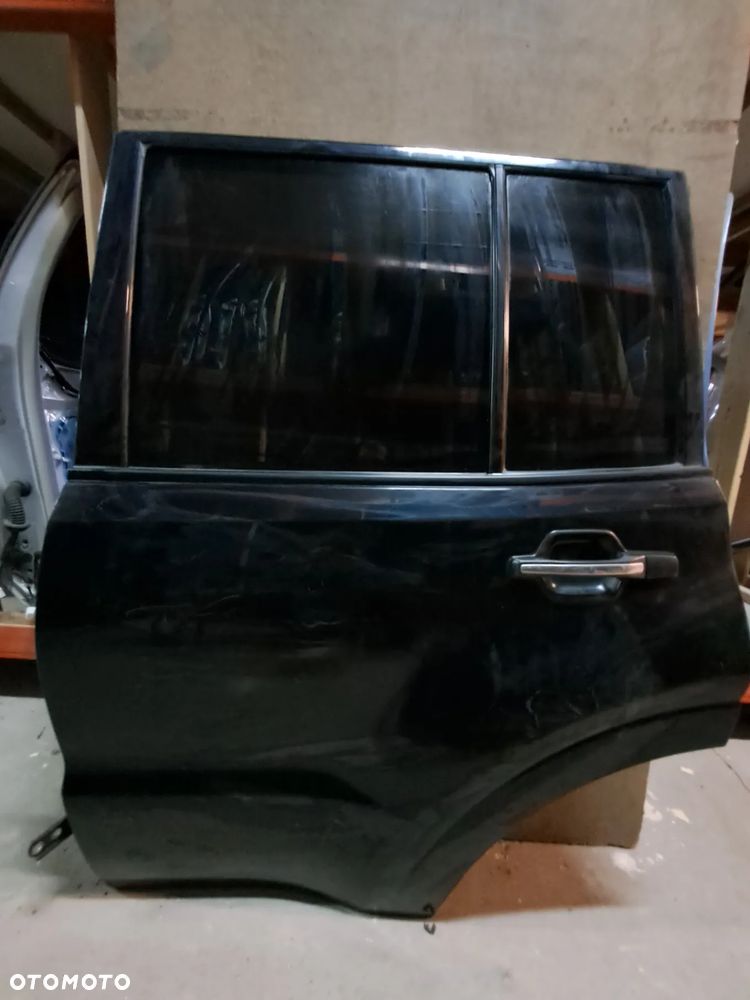 Drzwi Mitsubishi Pajero III 00-06' lewy tył (czarne)
