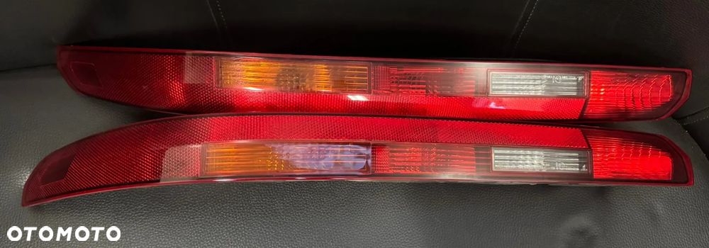 Audi Q7 4M lampa tylna prawa lewa w zderzak oryginalna lampy tył