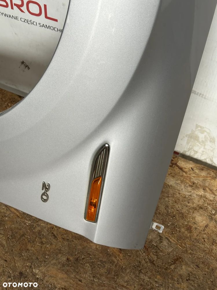 BŁOTNIK PRZEDNI LEWY FORD MONDEO IV  58 - 3