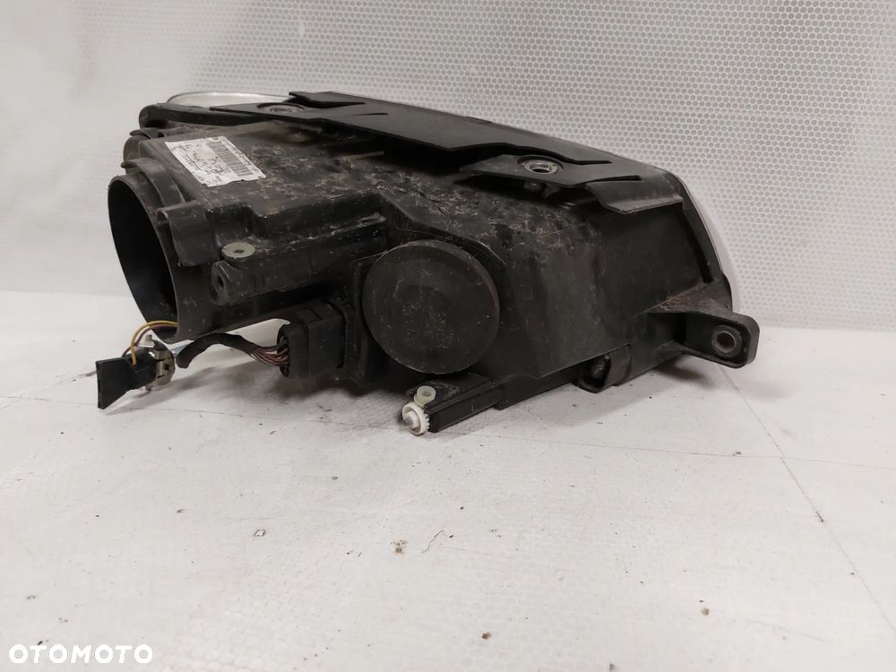 .  LAMPA PRZOD PRZEDNIA LEWA VOLKSWAGEN PASSAT B6 - 4