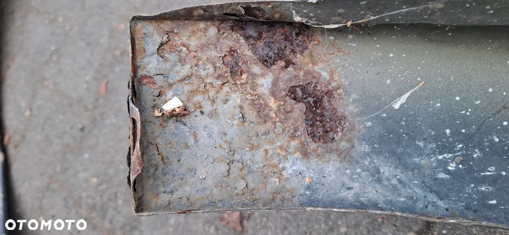 Blotnik lewy opel Astra H - 5