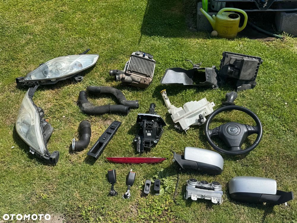 Mazda 5 CR 2005/2010r wybierak biegów lewarek biegów 1.8 2.0 benzyna i 2.0 diesel połoś lewą lub prawą amortyzator piasta wachacz chłodnica intercoolera Intercoler powietrza Trójnik wlewka króciec chłodnicy wody Chlodnica płynu Intercooler zbiornik spryskiwaczy - 2
