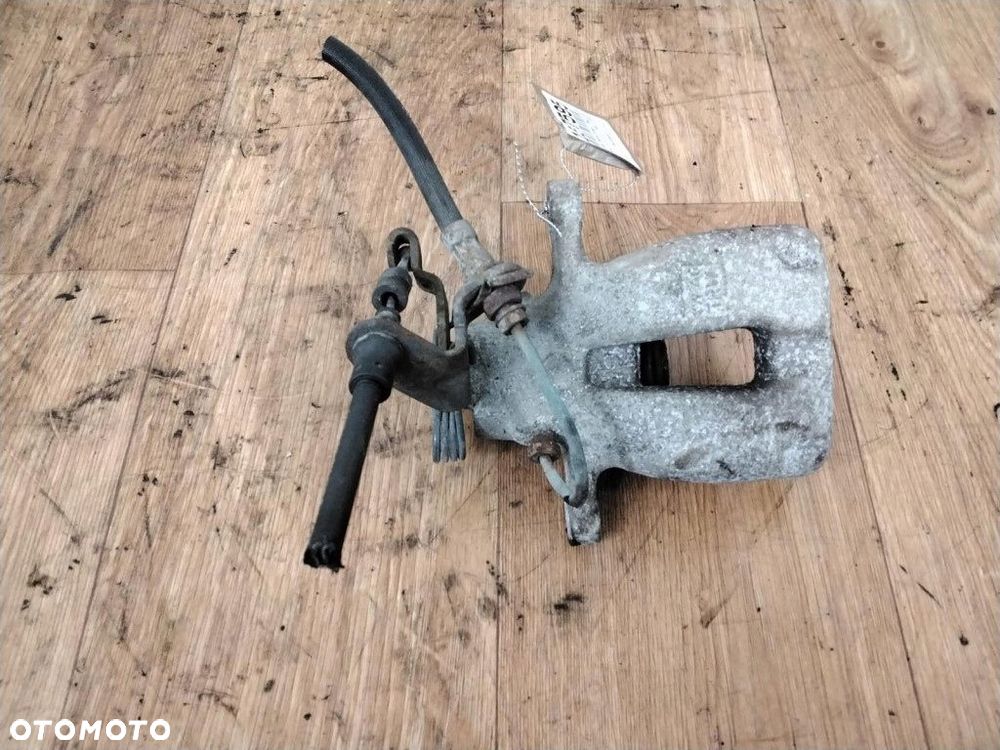 skoda octavia ii zacisk hamulcowy lewy tył - 1