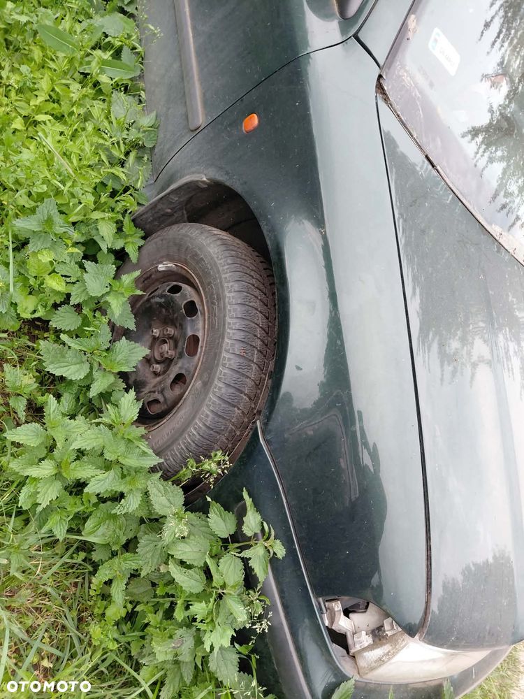 Części Skoda Octavia I 2000r. 1.9 90KM BŁOTNIK PRZÓD PRAWY LEWY - 1