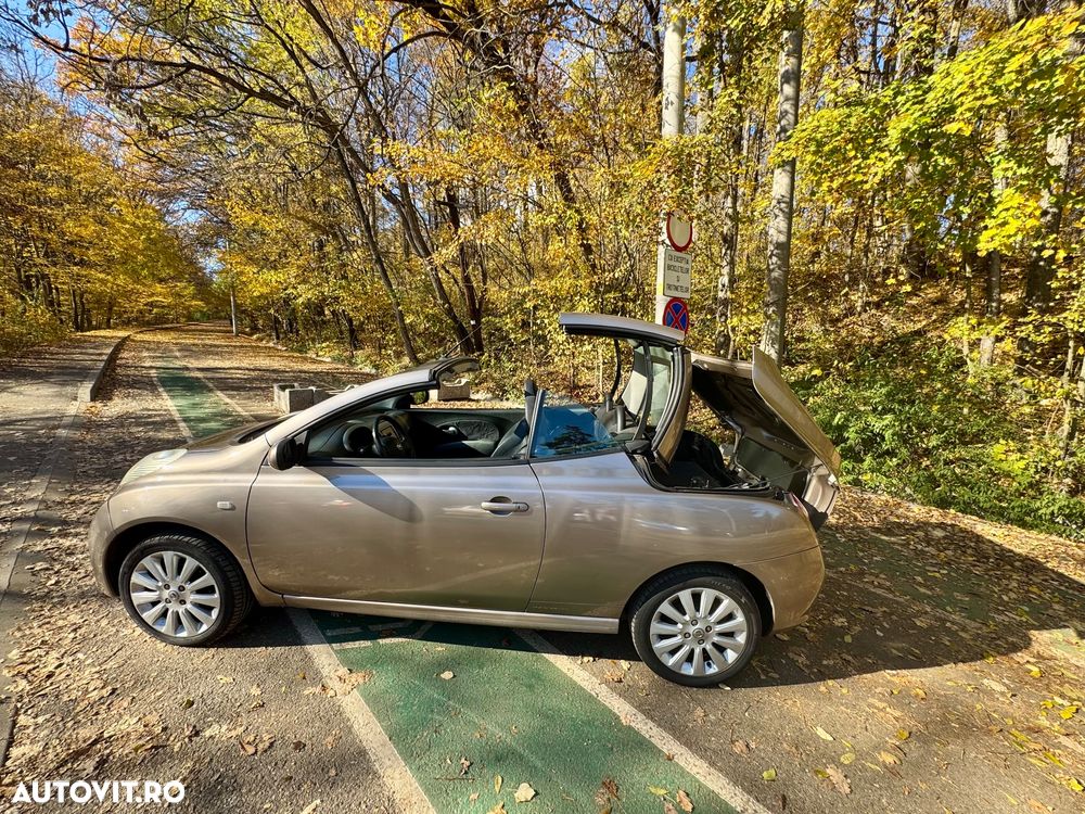 Nissan Micra 1.6 C+C Tekna + - 7