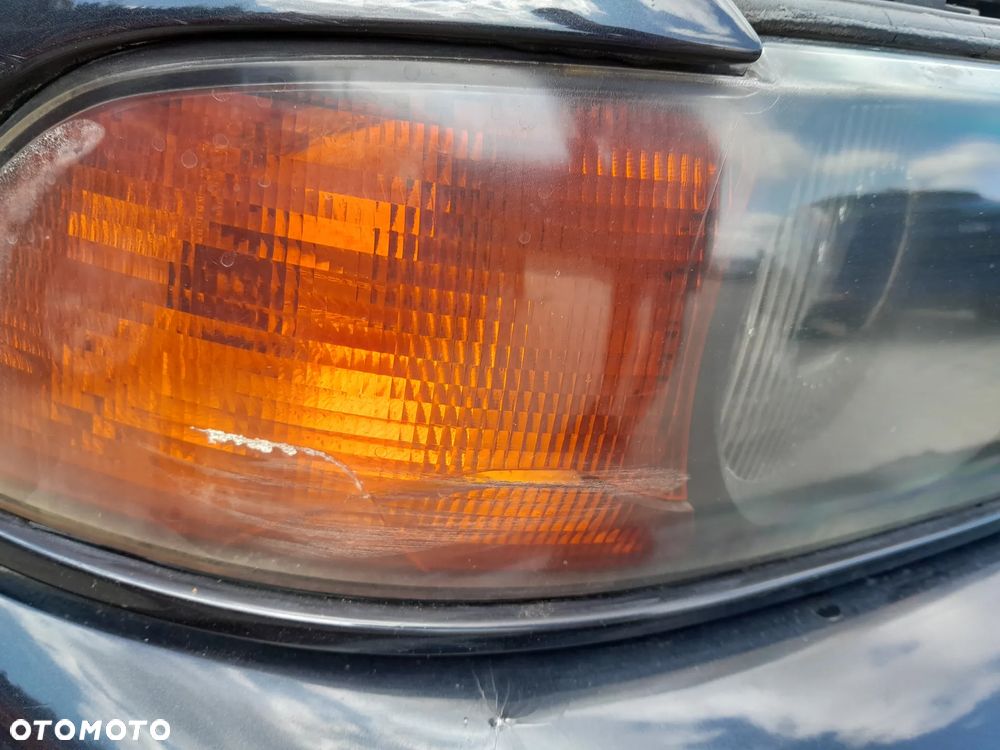 BMW E39 REFLEKTORY LAMPY PRZEDNIE KOMPLET XENON HELLA CZARNY ŚRODEK - 5