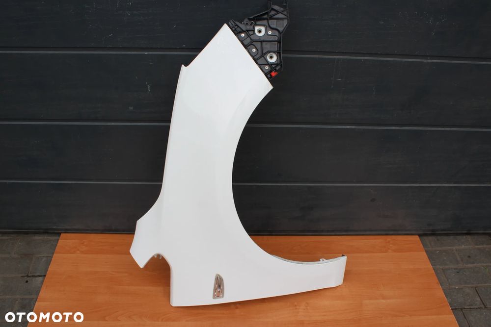 BŁOTNIK PRAWY PRZÓD PRZEDNI OPEL ASTRA J Y40R ZE ŚLIZGIEM