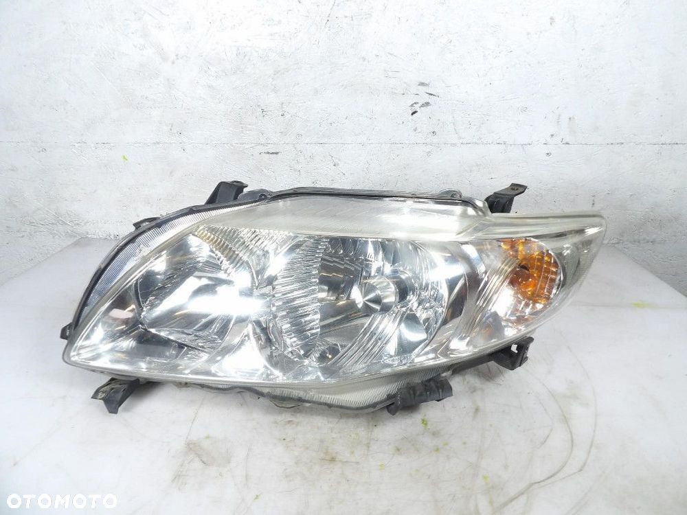 TOYOTA COROLLA E140 E150 REFLEKTOR LEWY XENON KOITO 12-520 - 1