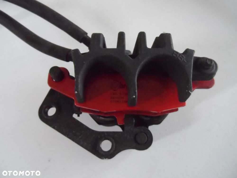 KAWASAKI ER6F zacisk hamulcowy przód P, L - 7