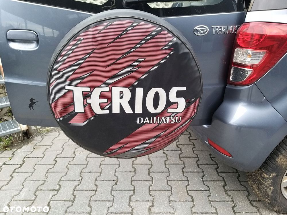 daihatsu terios ii 06r- koło zapasowe dojazdowe pokrowiec komplet mocowanie - 1