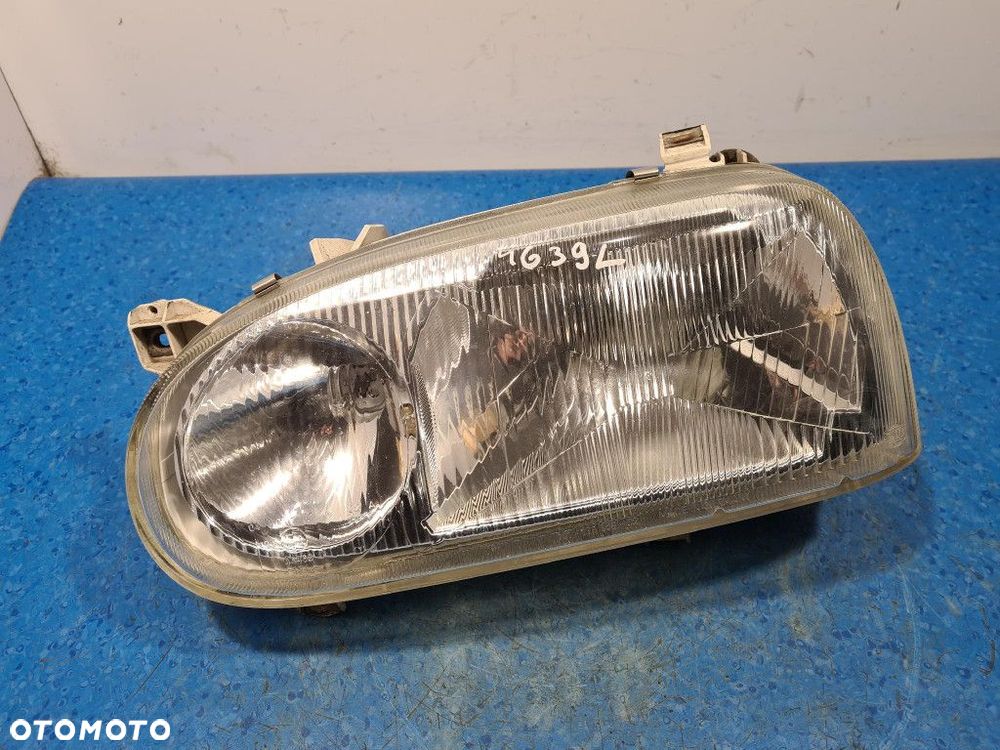 VOLKSWAGEN GOLF III HB REFLEKTOR LEWY - 1