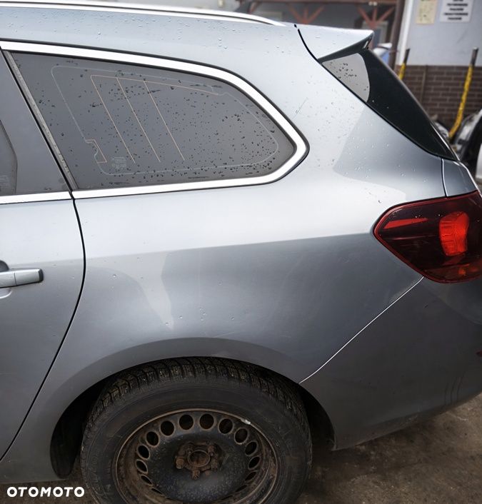OPEL ASTRA J IV 11r KOMBI ĆWIARTKA BŁOTNIK LEWY TYŁ Z179 - 1